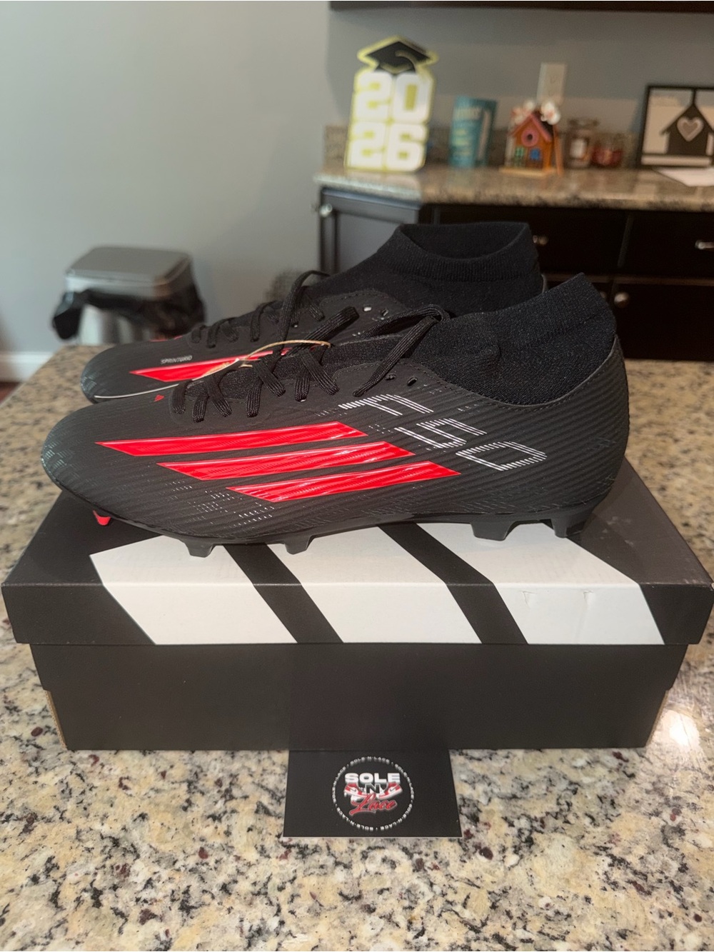 Size 11 Adidas F50 League Mid FG/MG Cleats Black Red SKU JR9007 Brand new